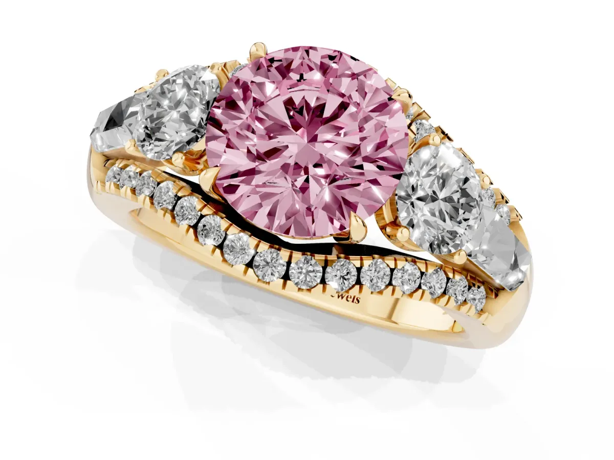 Fancy Pink Three-Stone Round Cut Diamond Engagement Ring with Pave Band and Prong Setting Yellow gold