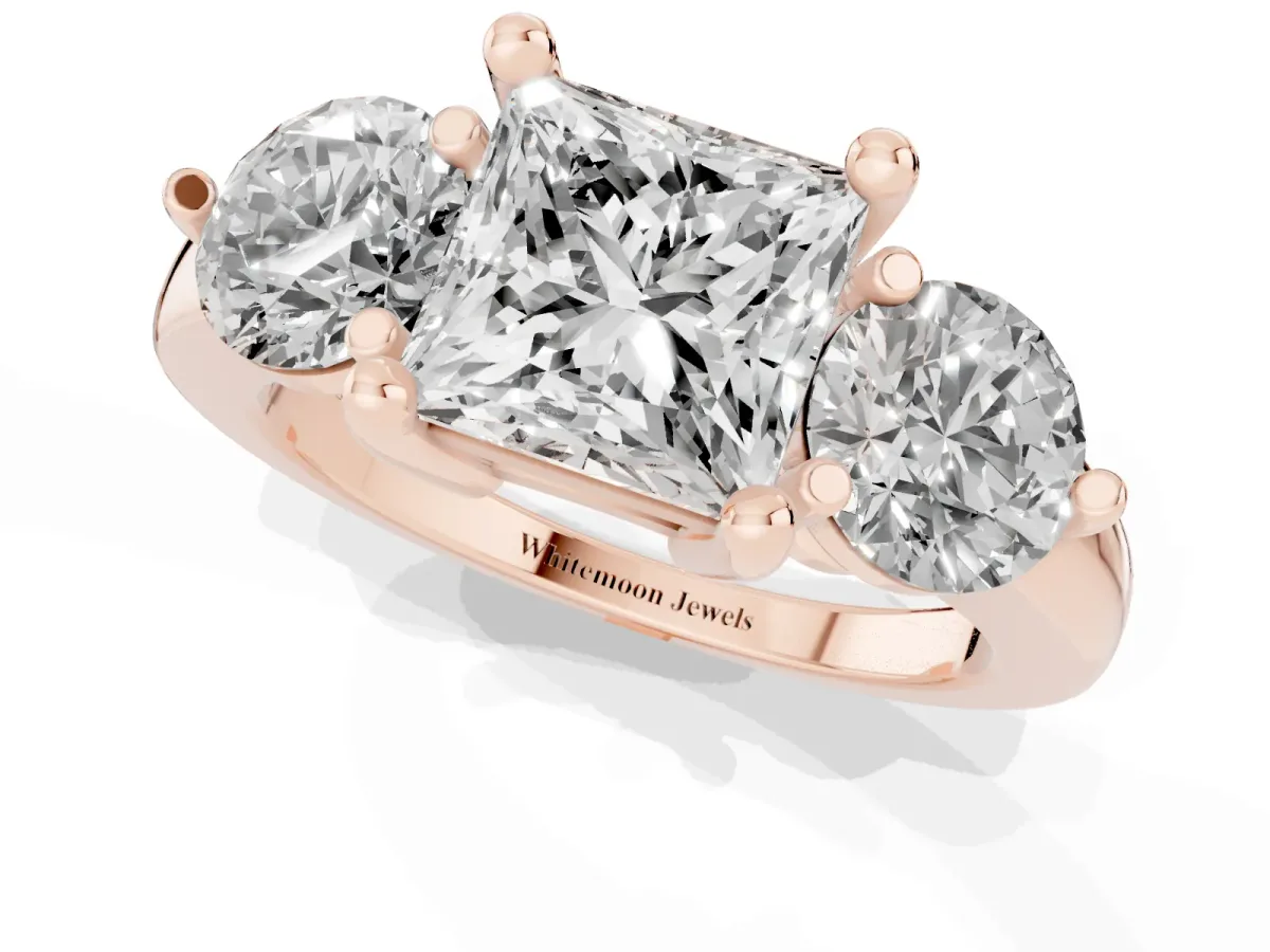 Three-Stone Princess Cut Brilliant Cut Solitaire Ring with Prong Setting on a Classic Band Rose gold