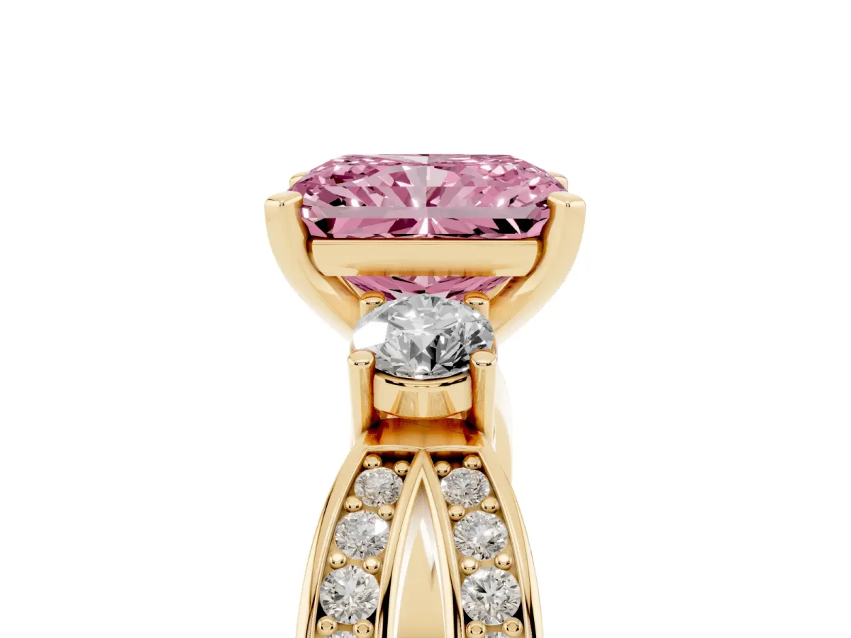 Fancy Pink Three-Stone Radiant Cut Cut Diamond Twist Band with Prong Setting Yellow gold