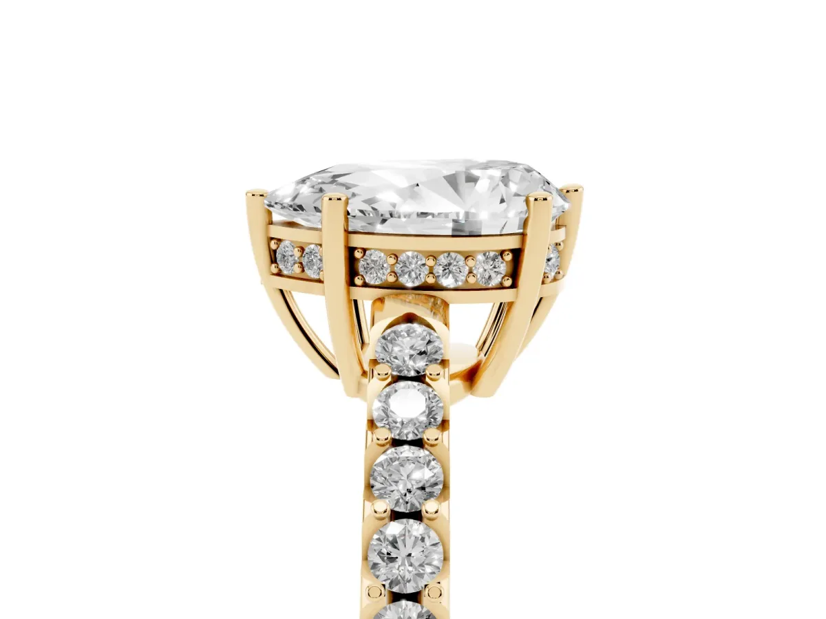 Pear Cut Solitaire Diamond Engagement Ring with Pavé Band and Six-Prong Setting Yellow gold