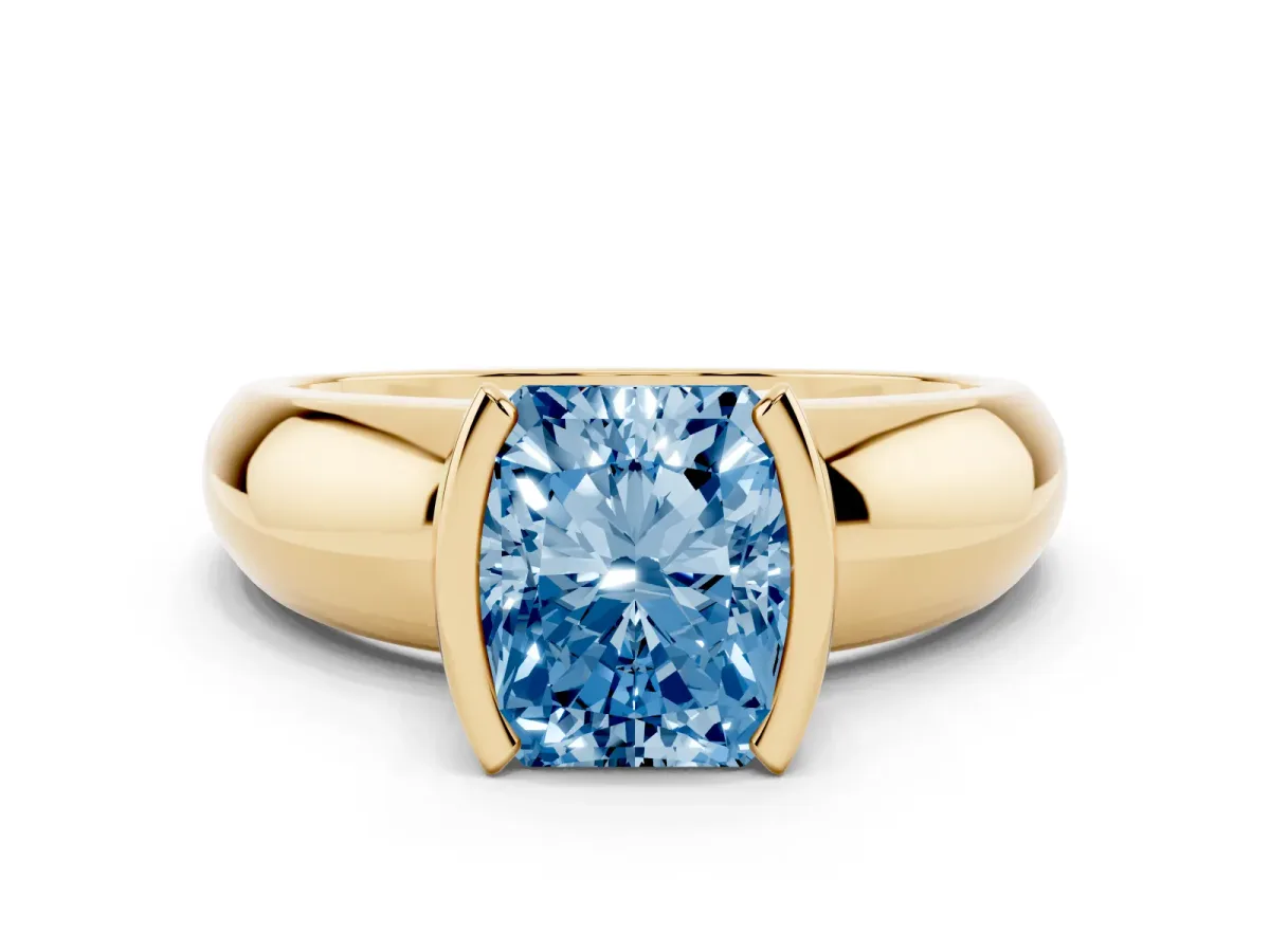 Fancy Blue Radiant Cut Solitaire Tension Set Diamond Ring with Wide Band Yellow gold