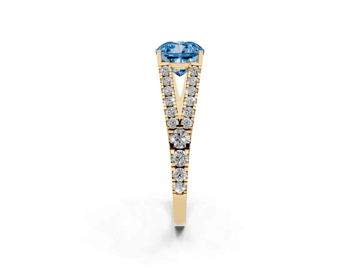 Fancy Blue Cushion Cut Diamond Split Shank Pavé Engagement Ring with Four-Prong Setting Yellow gold
