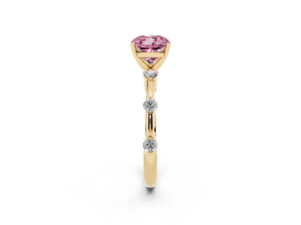 Fancy Pink Cushion Cut Solitaire Diamond Ring with Bezel Set Side Stones and Prong Setting Yellow gold