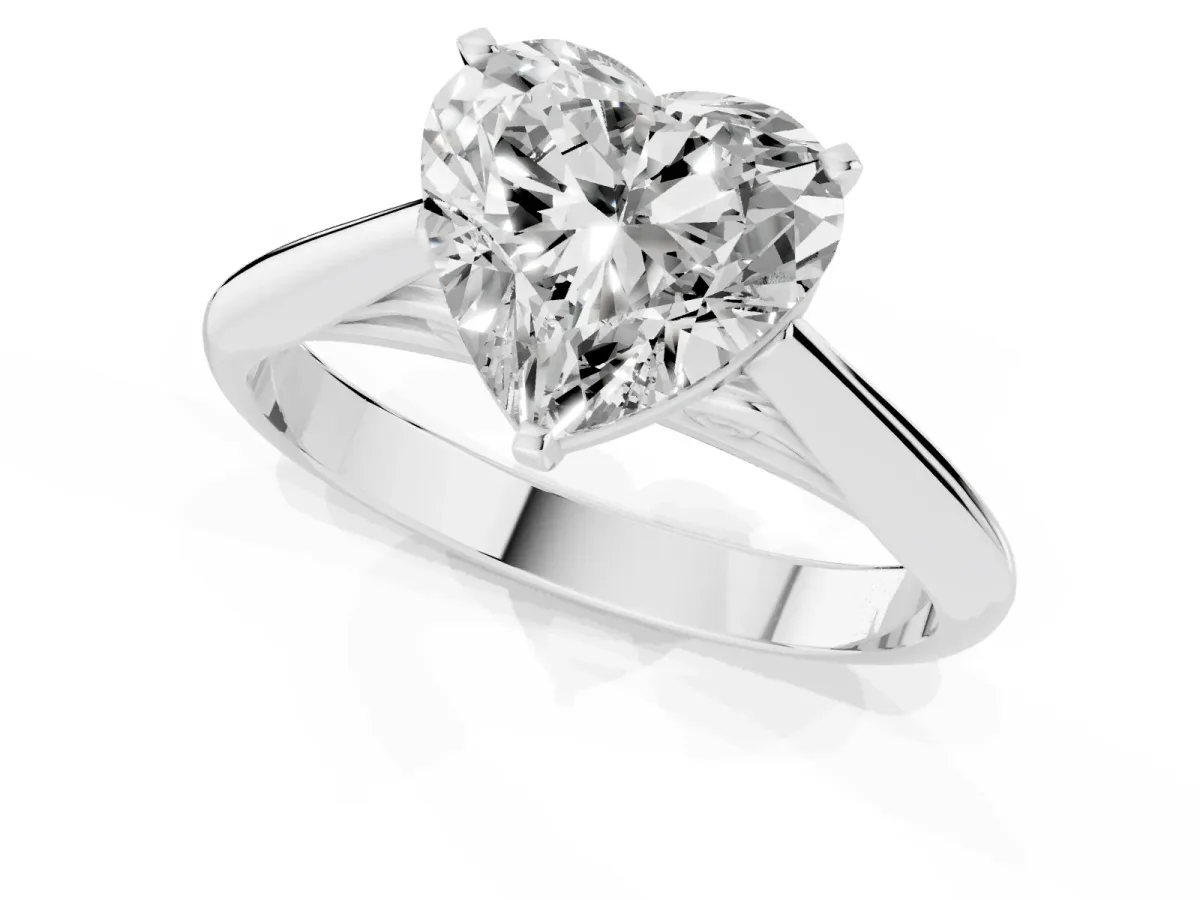 Heart Cut Diamond Solitaire Engagement Ring with Cathedral Setting and Four-Prong Mount Platinum