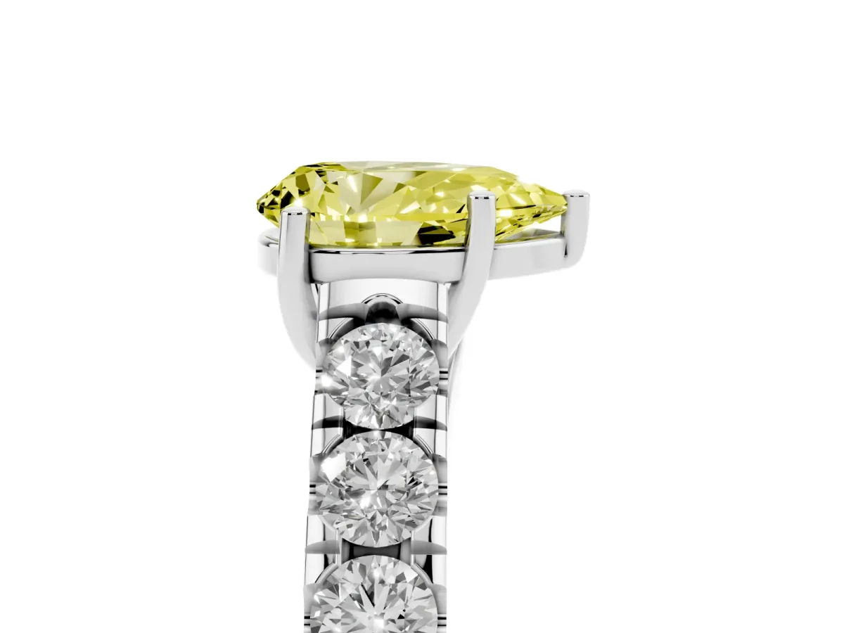 Fancy Yellow Pear Cut Cut Diamond Solitaire Ring with Micro Pave Band and Prong Setting Silver