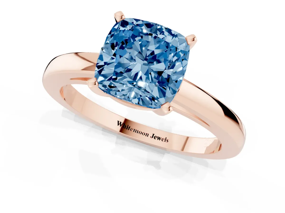 Fancy Blue Cushion Cut Solitaire Diamond Engagement Ring with Four-Prong Setting on a Classic Band Rose gold