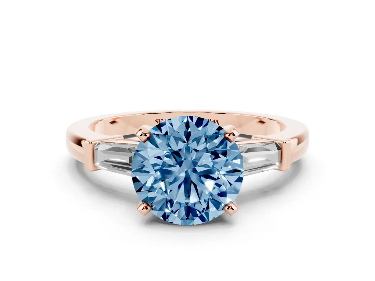 Fancy Blue Round Cut Cut Diamond Solitaire Ring with Tapered Baguette Accents and Four-Prong Setting Rose gold