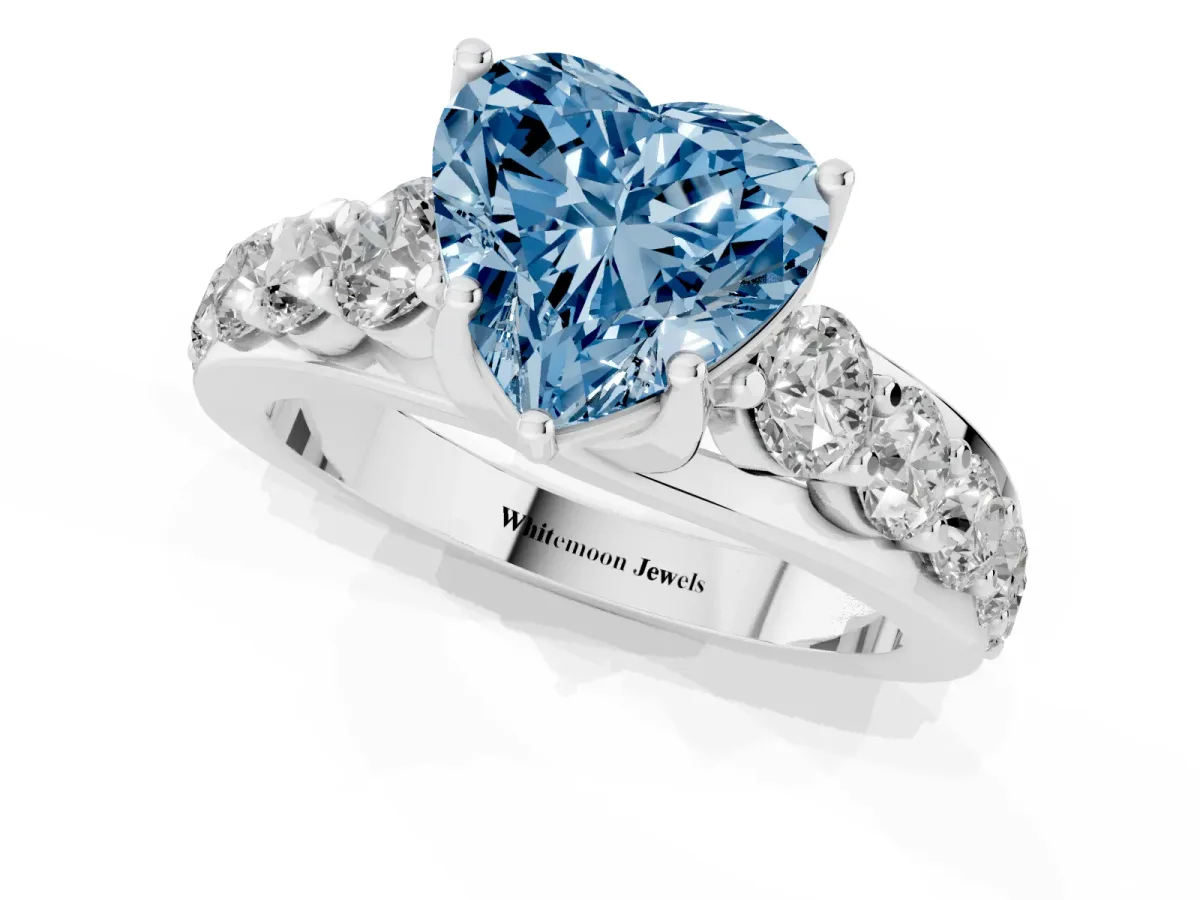 Fancy Blue Heart Cut Diamond Engagement Ring with Pavé Band and Four-Prong Setting Platinum