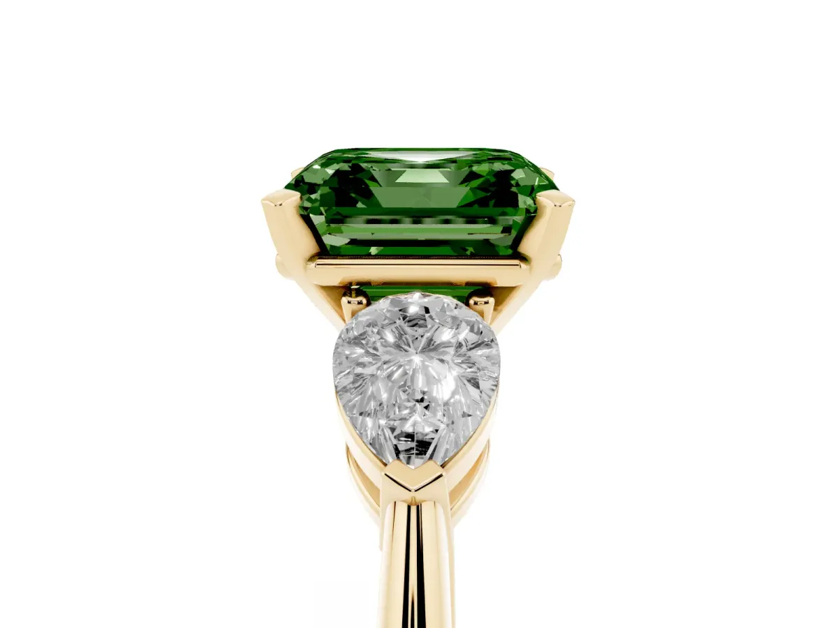 Fancy Green Three-Stone Asscher Cut Diamond Ring with Pear Side Stones and Four-Prong Setting Yellow gold