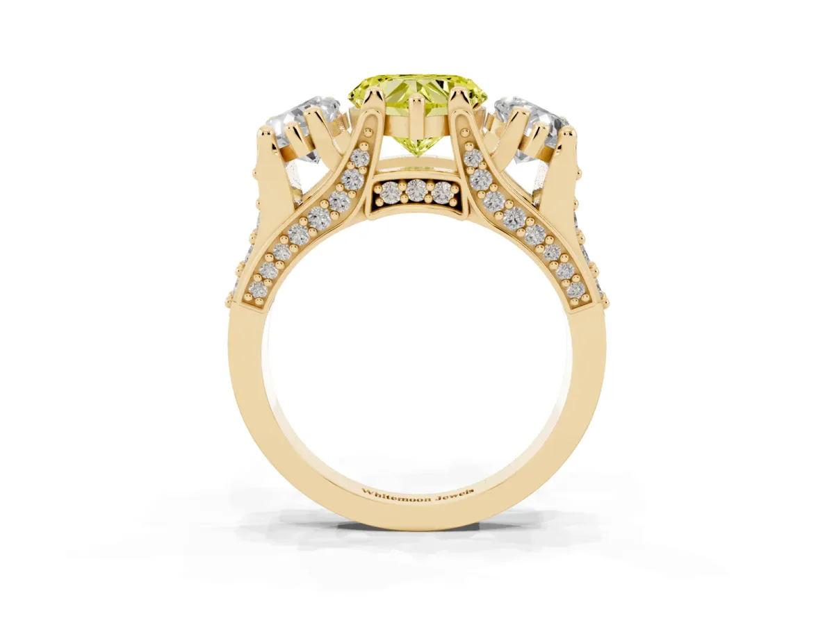Fancy Yellow Heart Cut Diamond Three-Stone Ring with Channel Set Band and Four-Prong Setting Yellow gold
