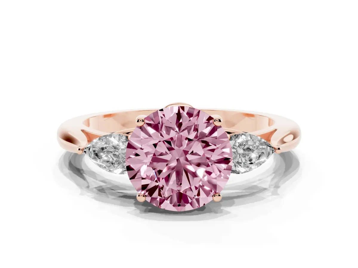 Fancy Pink Three-Stone Round Cut Diamond Ring with Pear Side Stones in Four-Prong Setting Rose gold