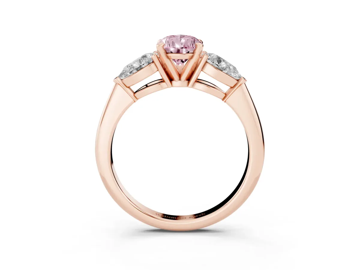 Fancy Pink Three-Stone Pear Cut Diamond Ring with Pear Side Stones and Four-Prong Setting Rose gold