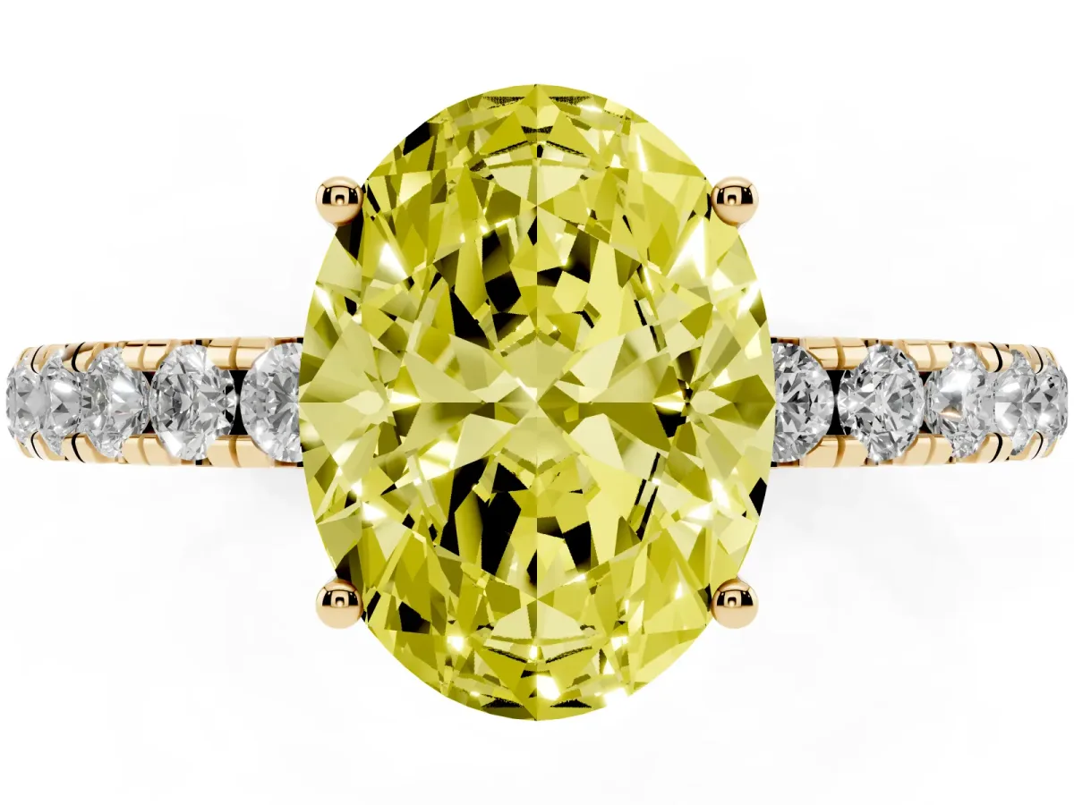 Fancy Yellow Oval Cut Diamond Pavé Solitaire Engagement Ring with Four-Prong Setting Yellow gold
