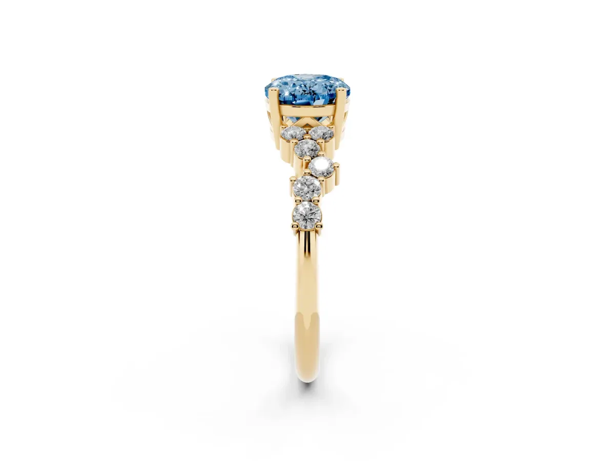 Fancy Blue Oval Cut Diamond Scattered Round Accent Ring with Prong Setting Yellow gold