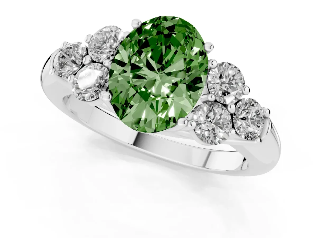 Fancy Green Oval Cut Cut Diamond Cluster Ring with Round Accent Stones and Prong Setting on a Classic Band White gold
