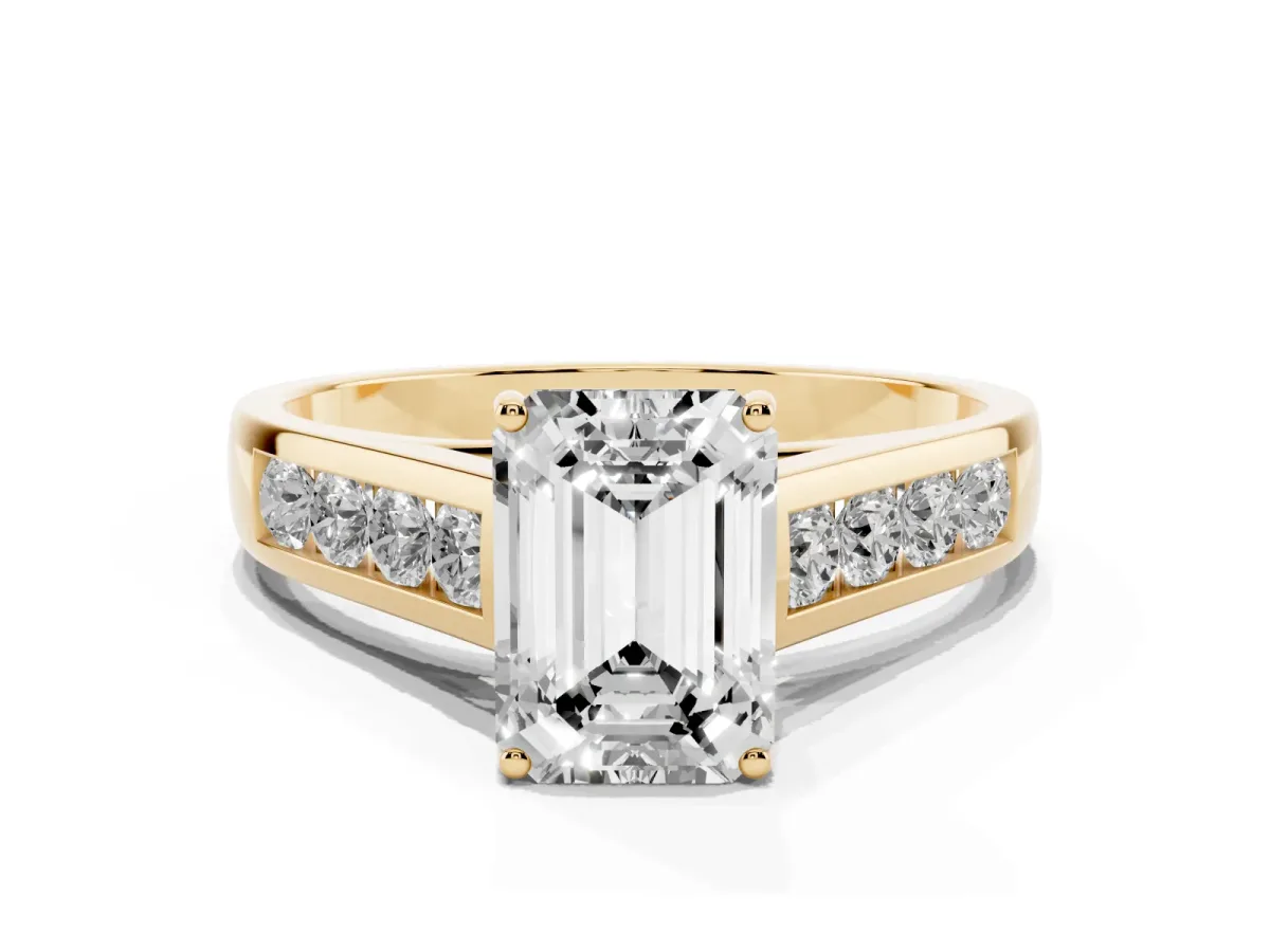 Emerald Cut Brilliant Channel-Set Solitaire Ring with Four-Prong Setting Yellow gold