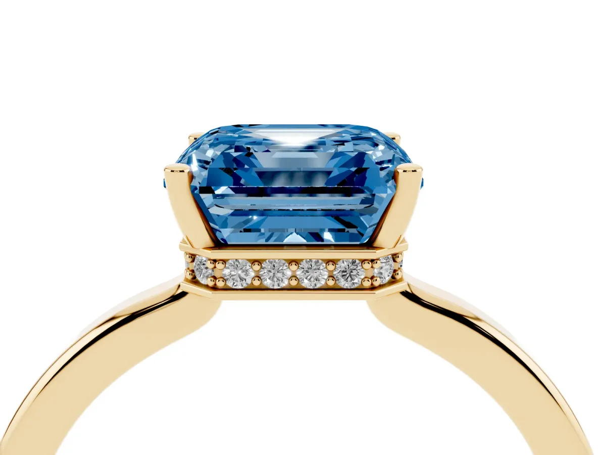 Fancy Blue Asscher Cut Cut Solitaire Engagement Ring with Four-Prong Setting on a Classic Band Yellow gold