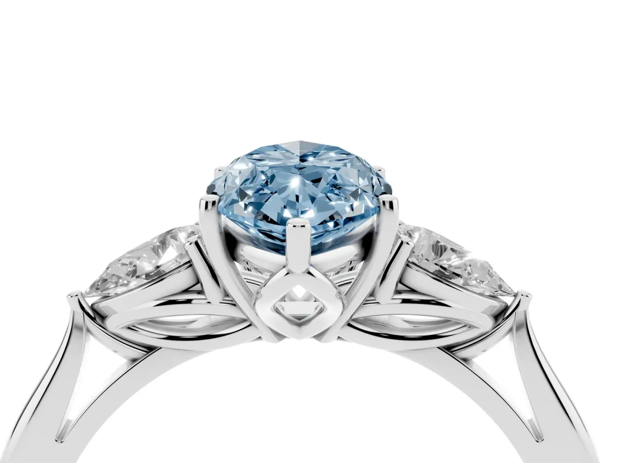 Fancy Blue Three-Stone Marquise Cut Diamond Ring with Pear Side Stones in Four-Prong Setting Silver