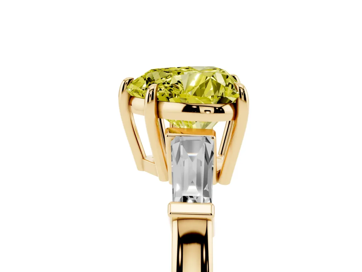 Fancy Yellow Heart Cut Diamond Three-Stone Ring with Tapered Baguette Side Stones and Prong Setting Yellow gold