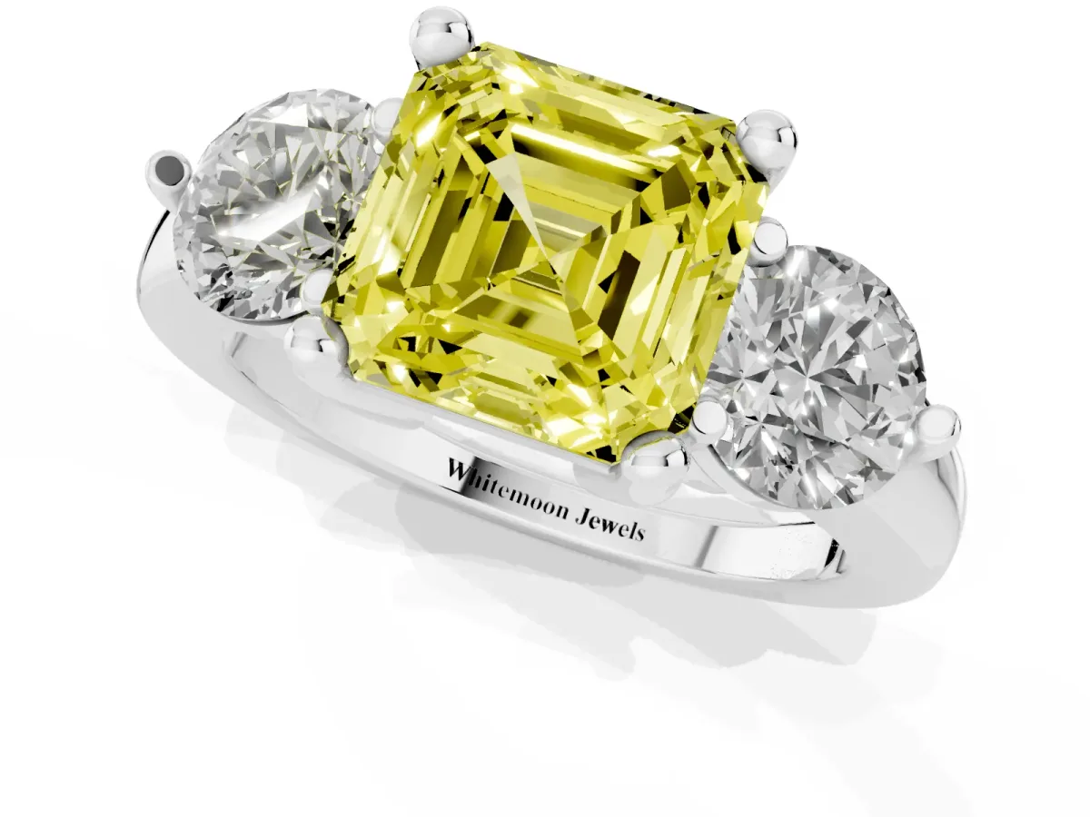 Fancy Yellow Three-Stone Asscher Cut Brilliant Cut Solitaire Ring with Prong Setting on a Classic Band White gold