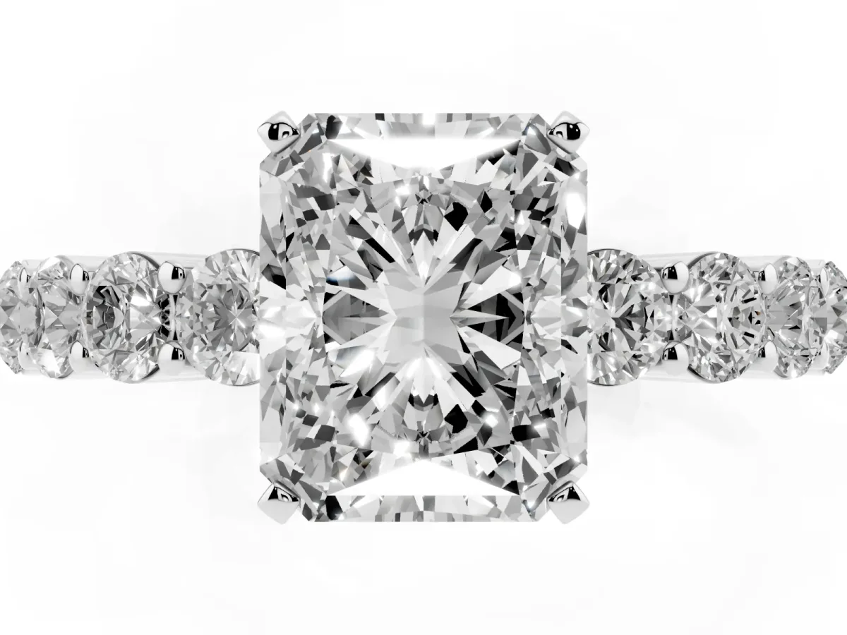 Radiant Cut Diamond Solitaire Ring with Shared Prong Round Side Stones Silver