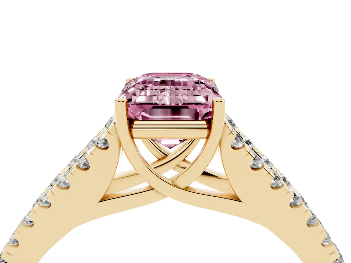 Fancy Pink Emerald Cut Diamond Split Shank Engagement Ring with Round Pavé and Prong Setting Yellow gold