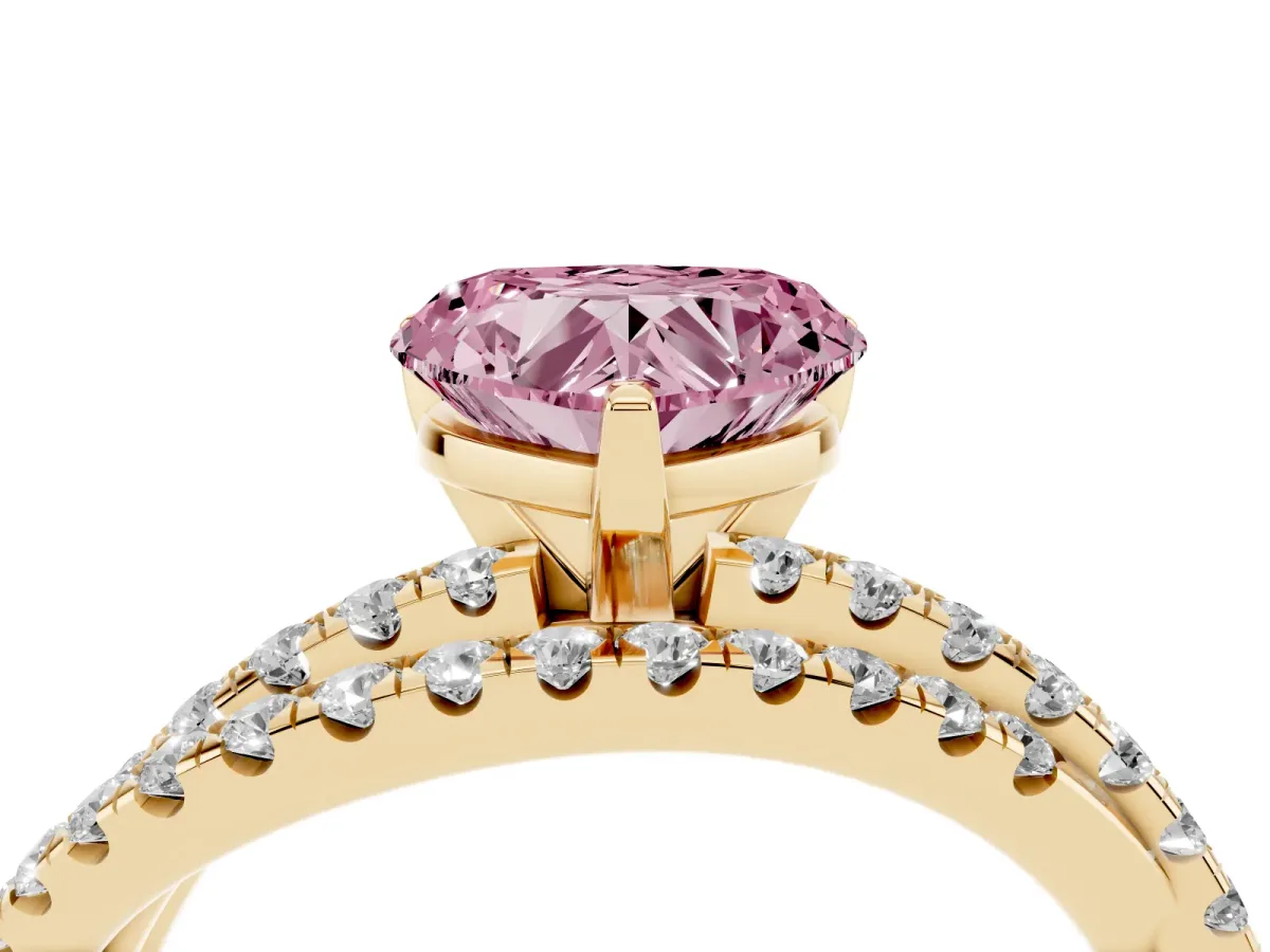 Fancy Pink Heart Cut Solitaire Twist Band with Pavé Setting and Four-Prong Setting Yellow gold