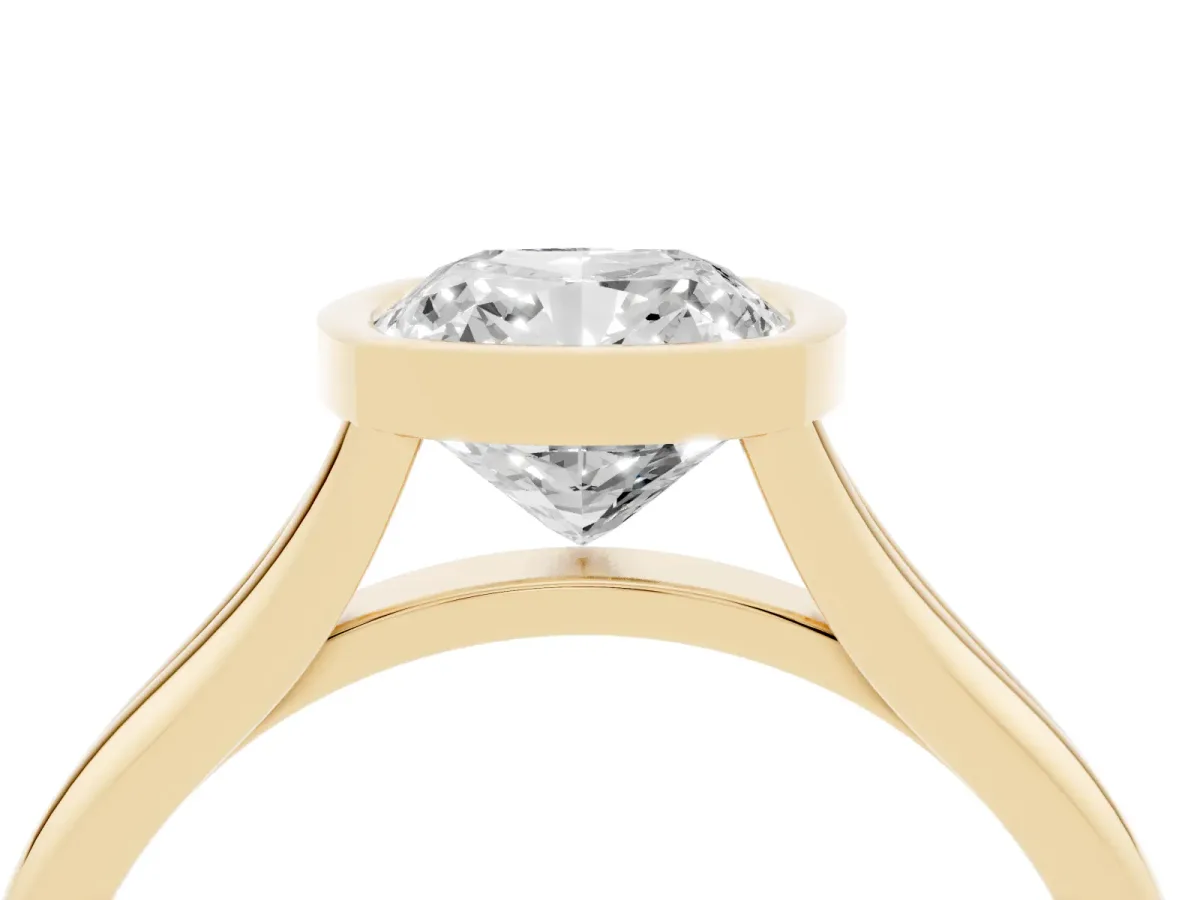Bezel Set Cushion Cut Cut Solitaire Ring with Tapered Band Yellow gold