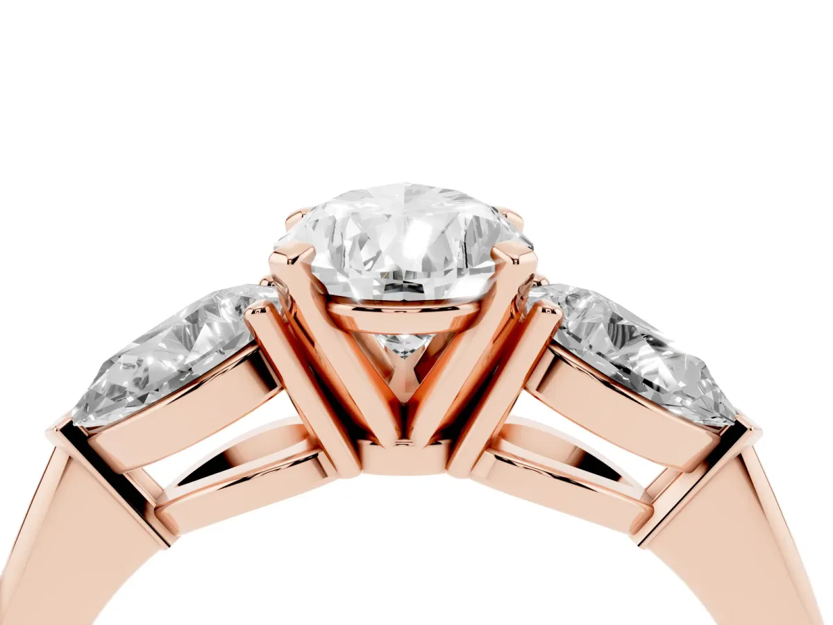 Three-Stone Pear Cut Diamond Ring with Pear Side Stones and Four-Prong Setting Rose gold