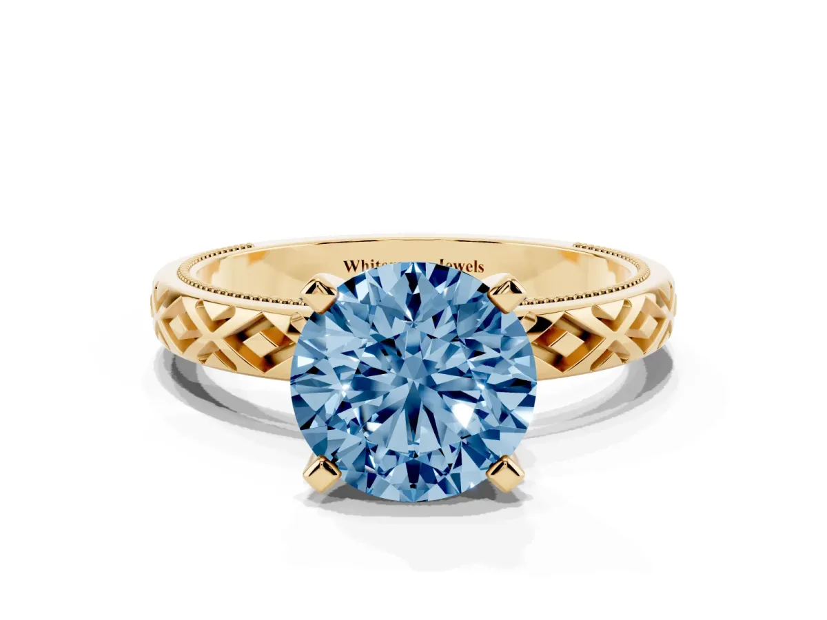 Fancy Blue Round Cut Solitaire Diamond Ring with Milgrain and Black Enamel X Pattern Band Yellow gold