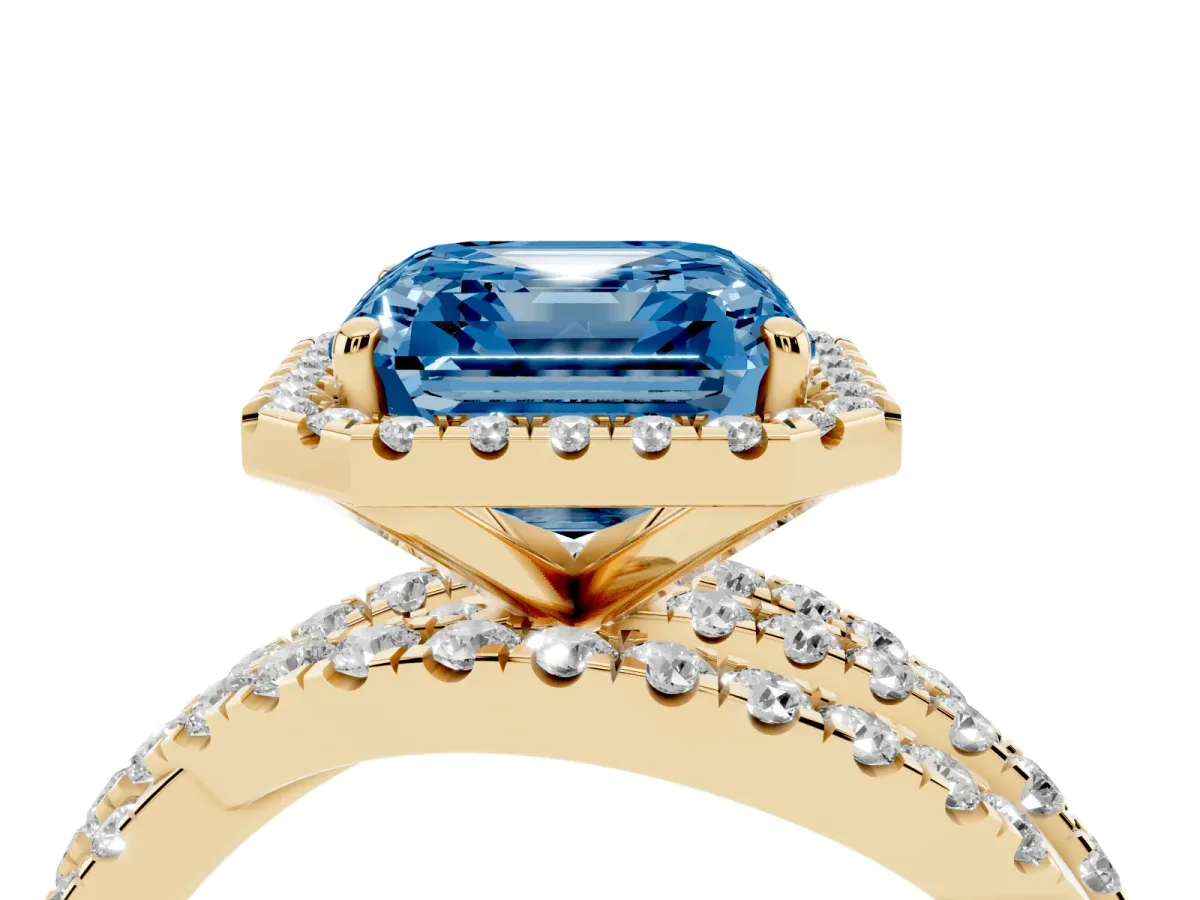 Fancy Blue Asscher Cut Diamond Halo Ring with Round Split Shank and Prong Setting Yellow gold