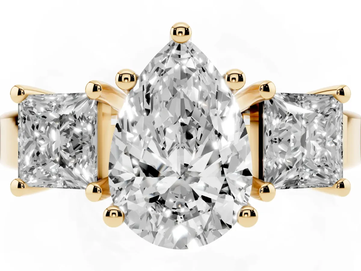 Three-Stone Pear Cut Cut Solitaire Ring with Prong Setting Yellow gold