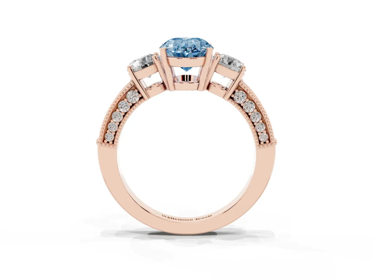Fancy Blue Oval Cut Three-Stone Diamond Ring with Pavé Band and Four-Prong Setting Rose gold