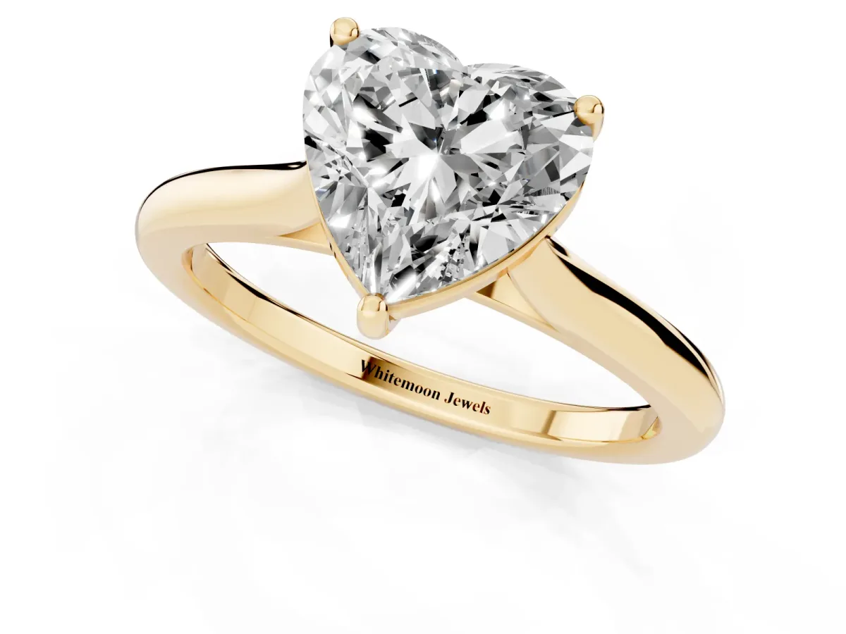 Heart Cut Cut Solitaire Ring with Cathedral Band and Four-Prong Setting Yellow gold