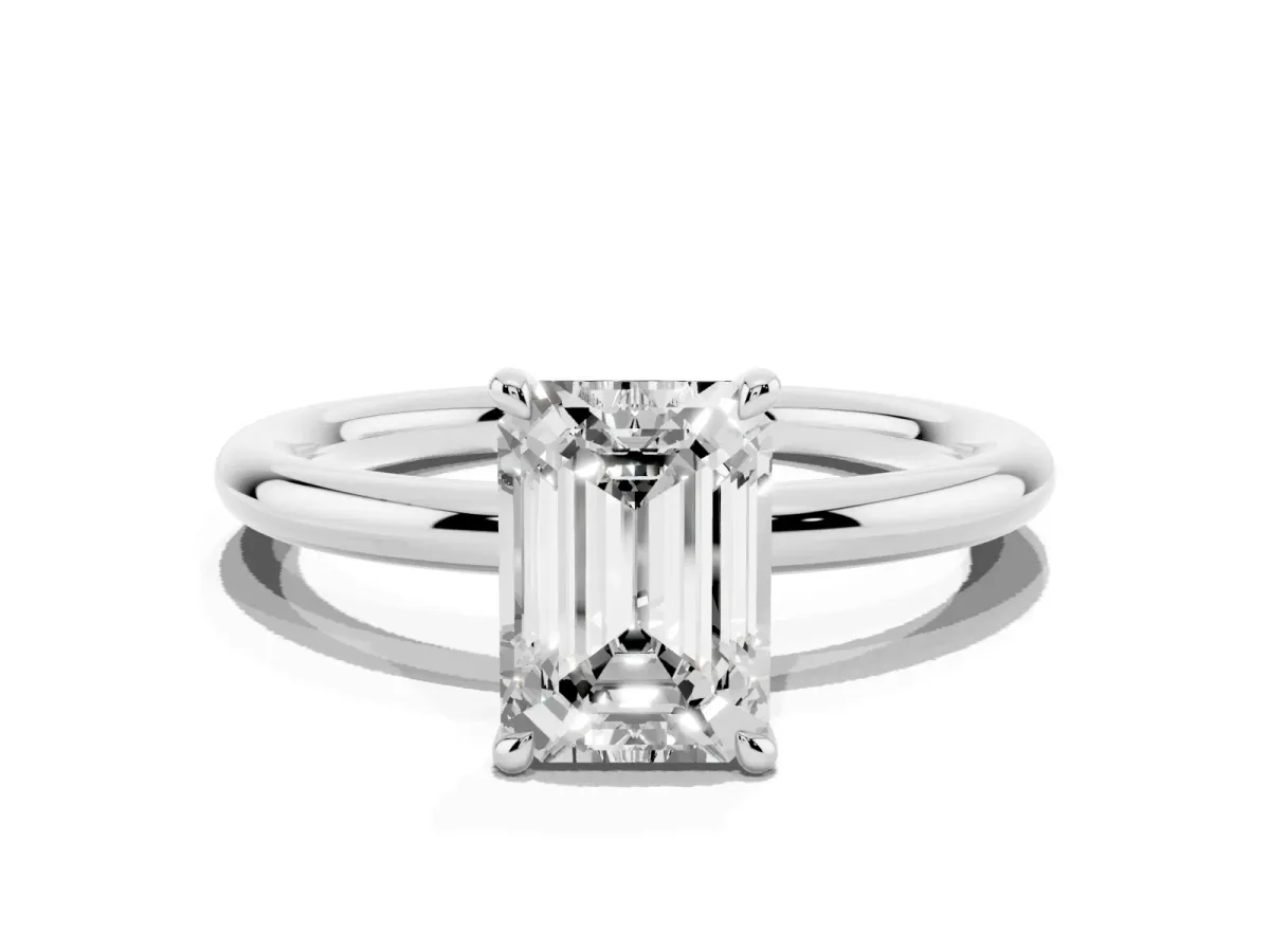 Emerald Cut Diamond Solitaire Ring with Thin Band and Four-Prong Setting White gold