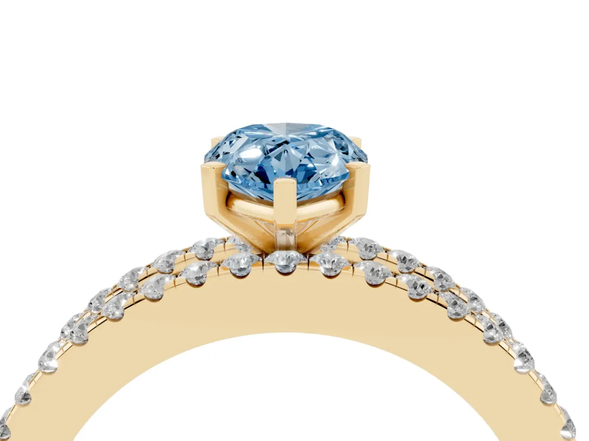 Fancy Blue Pear Cut Diamond Solitaire Ring with Pavé and Channel Set Band Yellow gold