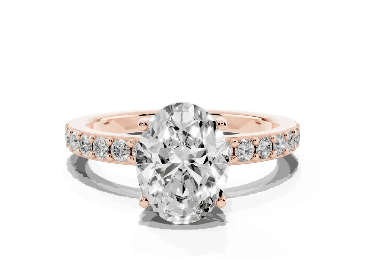 Oval Cut Cut Diamond Solitaire with Pave Band and Four-Prong Setting Rose gold