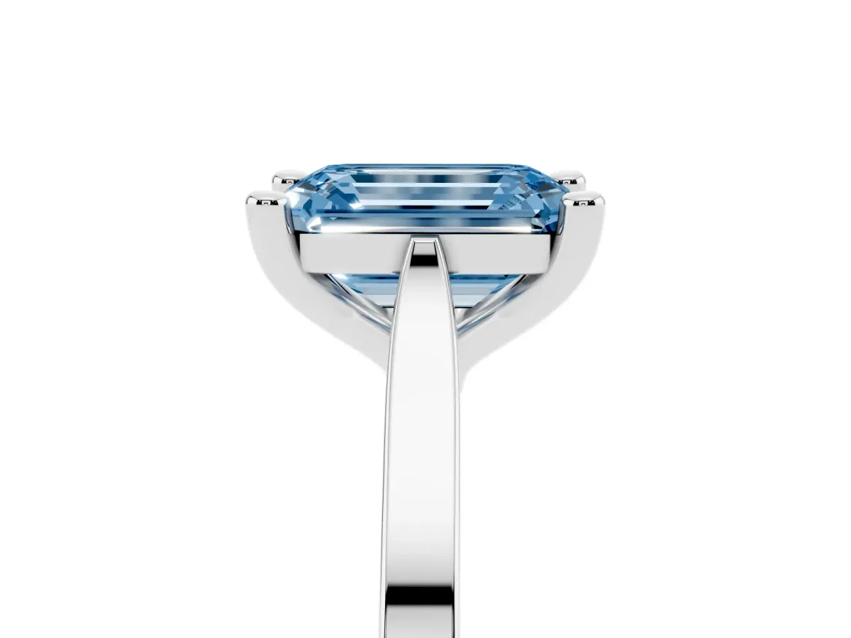 Fancy Blue Emerald Cut Solitaire Diamond Ring with Four-Prong Setting and Tapered Band Silver