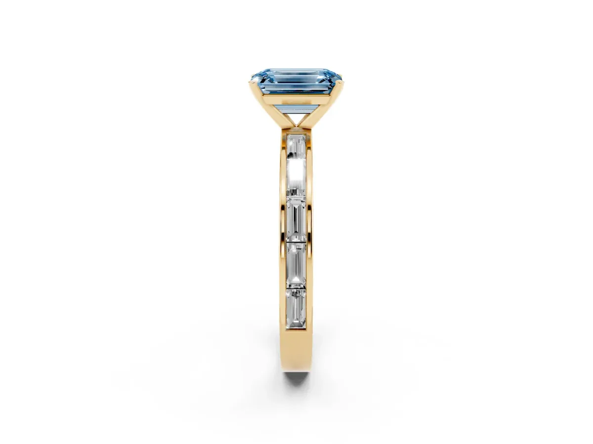 Fancy Blue Emerald Cut Solitaire Diamond Ring with Channel-Set Baguette Band and Four-Prong Setting Yellow gold