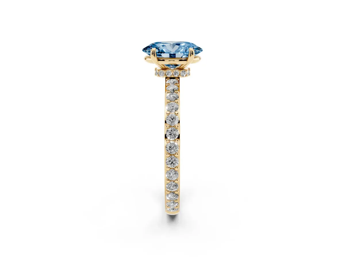 Fancy Blue Oval Cut Diamond Pavé Engagement Ring with Round Accents and Prong Setting Yellow gold