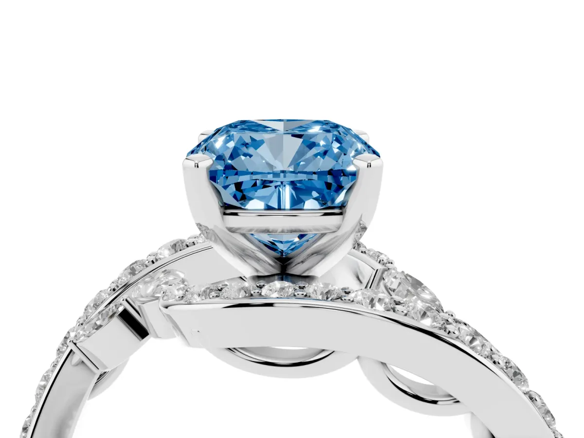Fancy Blue Cushion Cut Solitaire with Pavé Twist Band and Four-Prong Setting Silver