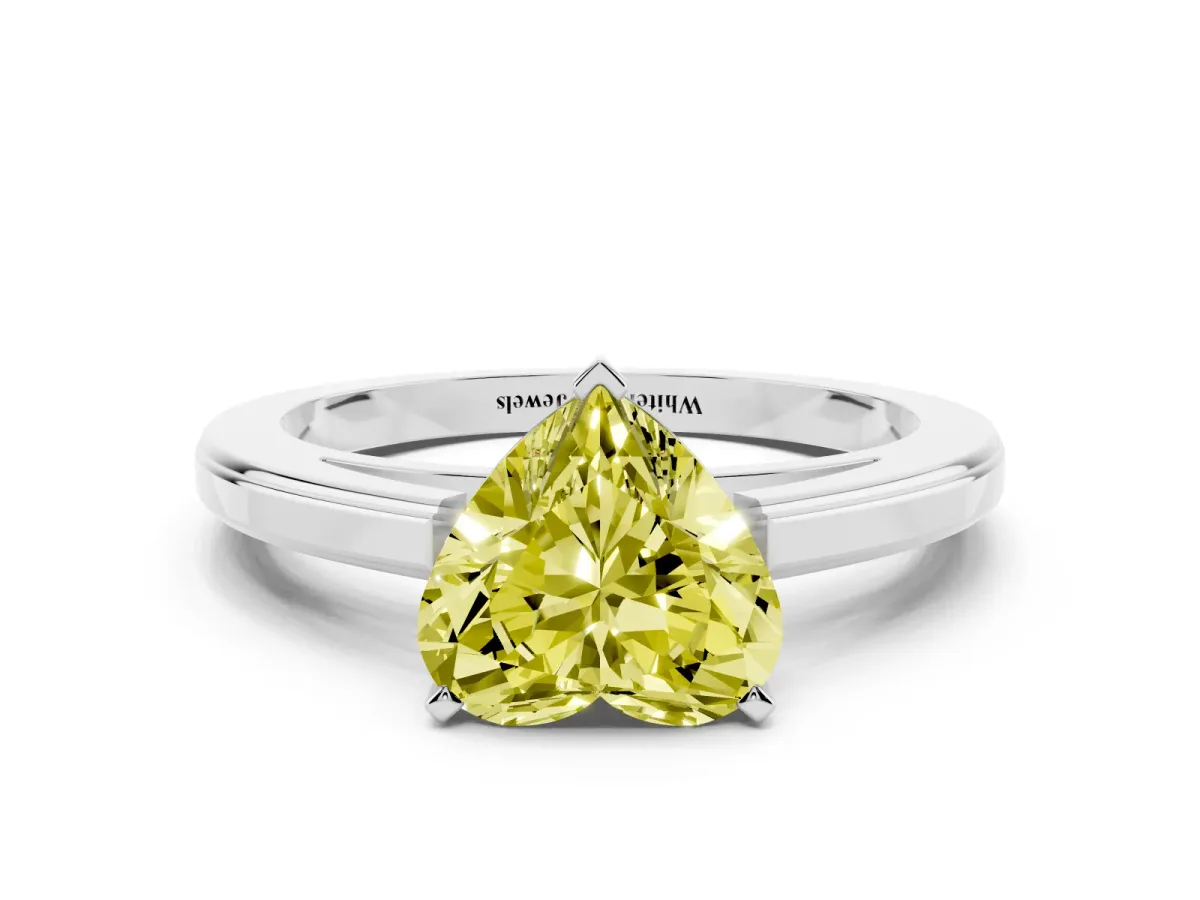 Fancy Yellow Heart Cut Solitaire Diamond Ring with Four-Prong Setting and Classic Band Silver