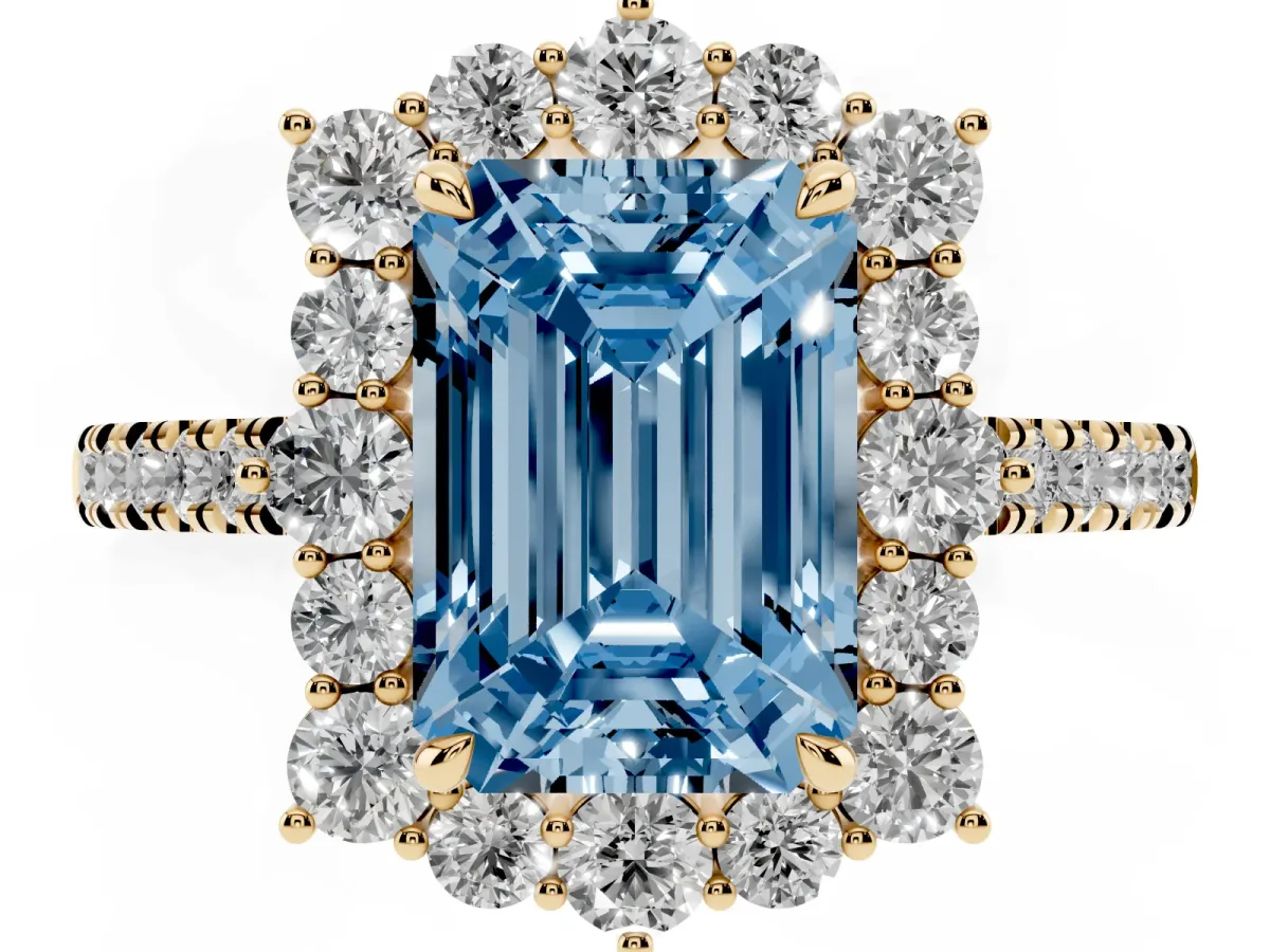 Fancy Blue Emerald Cut Halo Diamond Ring with Pavé Band and Prong Setting Yellow gold
