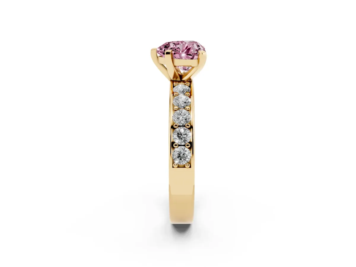 Fancy Pink Heart Cut Diamond Engagement Ring with Channel Set Round Band and Prong Setting Yellow gold