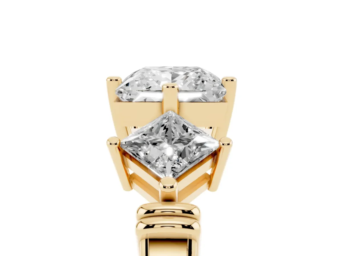 Three-Stone Princess Cut and Princess Cut Diamond Ring with Channel Band and Four-Prong Setting Yellow gold