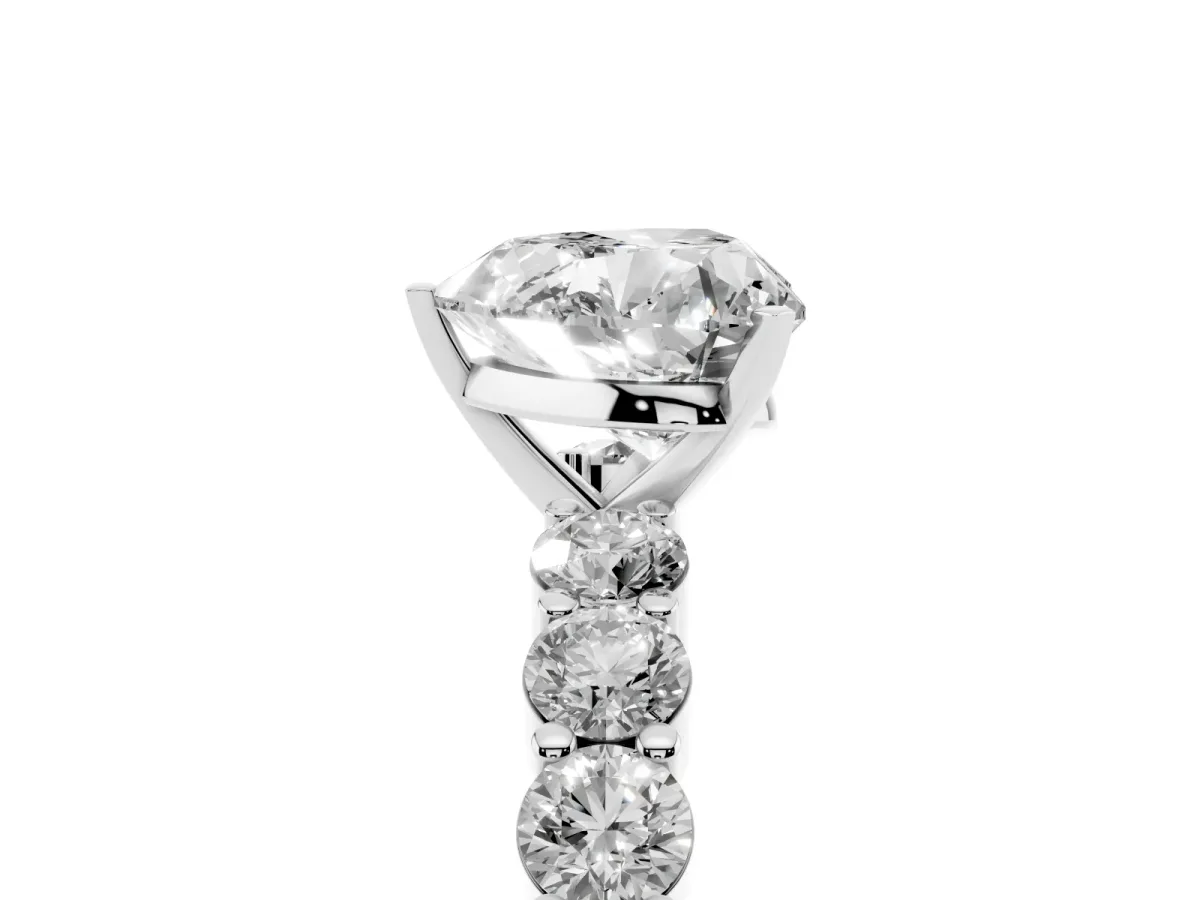 Heart Cut Diamond Solitaire Ring with Shared Prong Round Side Stones Silver