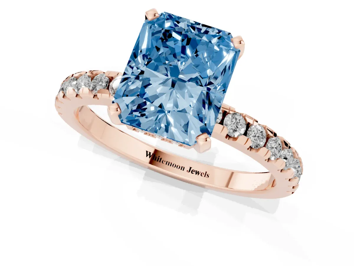 Fancy Blue Radiant Cut Diamond Solitaire Ring with Round Pavé Band and Four-Prong Setting Rose gold