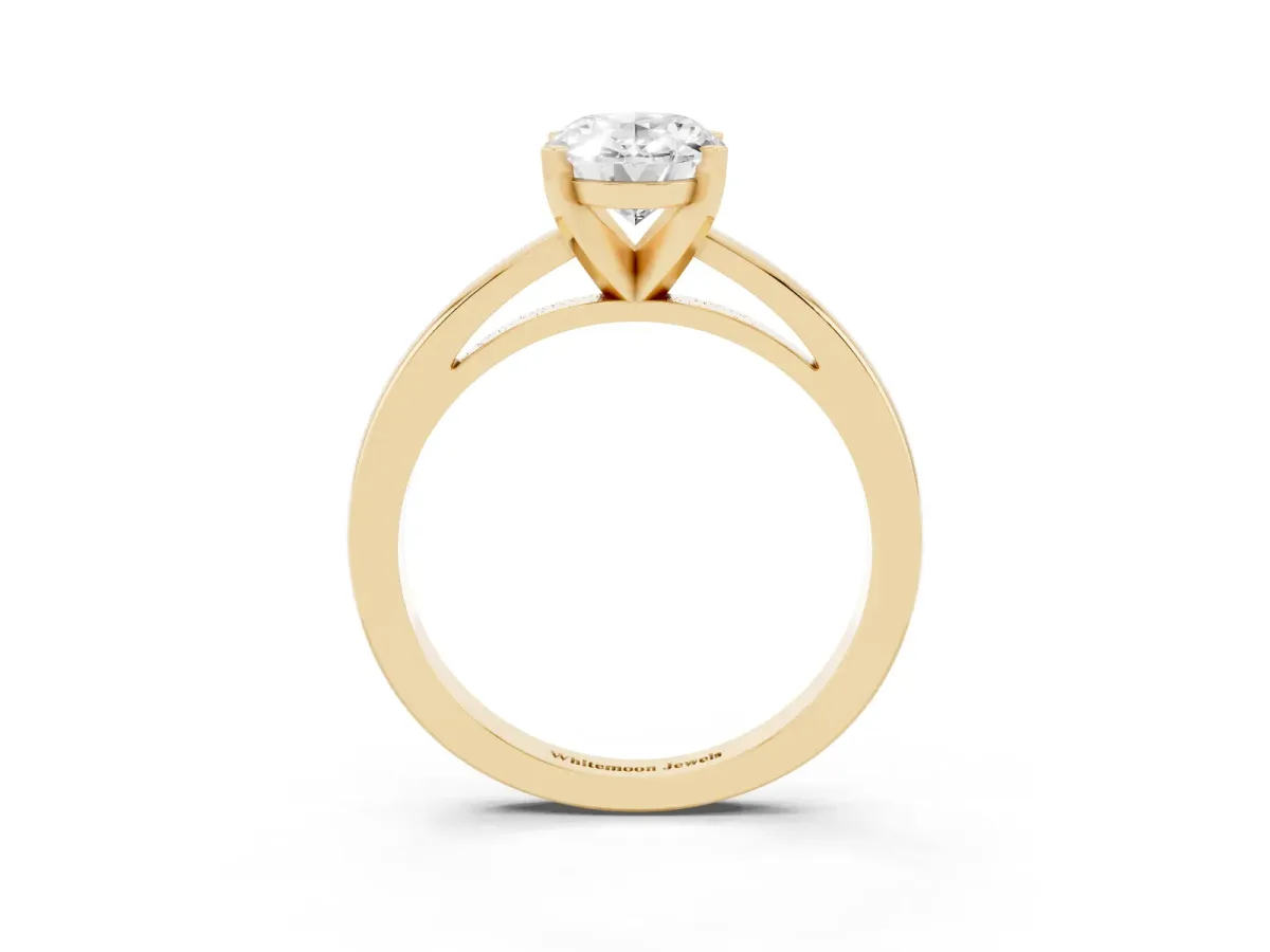 Oval Cut Solitaire Diamond Engagement Ring with Four-Prong Setting on a Classic Band Yellow gold