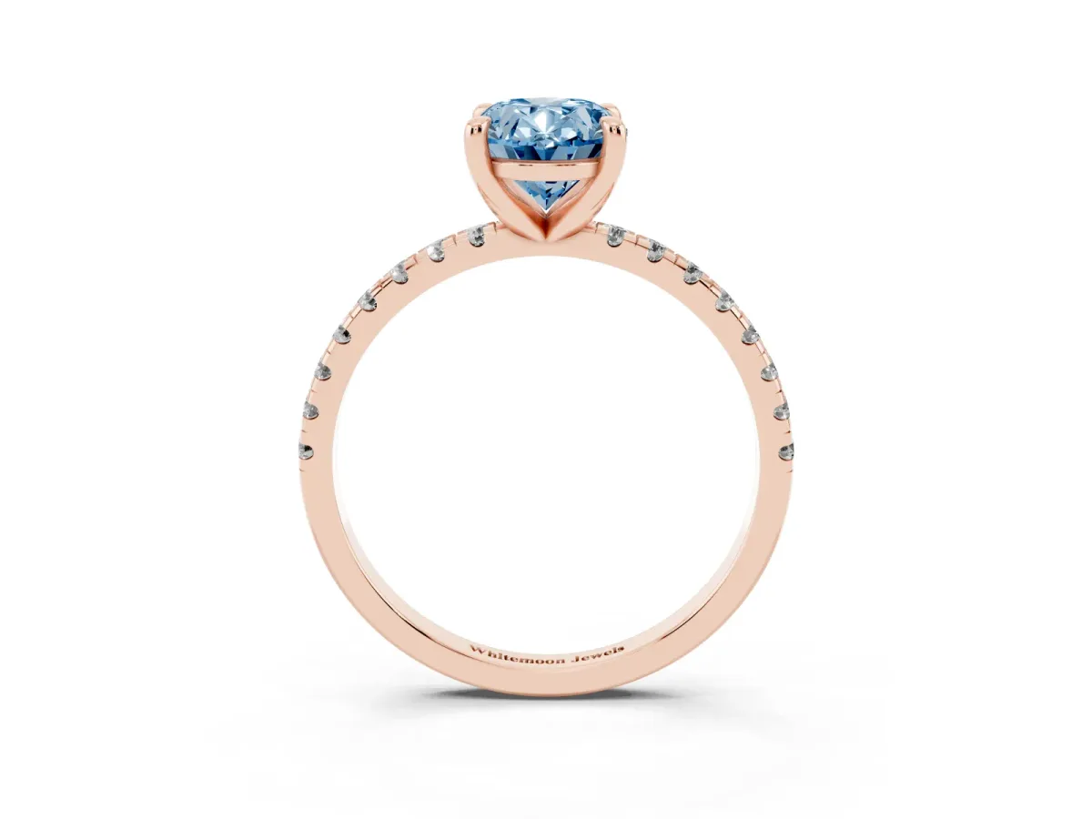 Fancy Blue Oval Cut Diamond Brilliant Solitaire Ring with Pavé Band and Four-Prong Setting Rose gold
