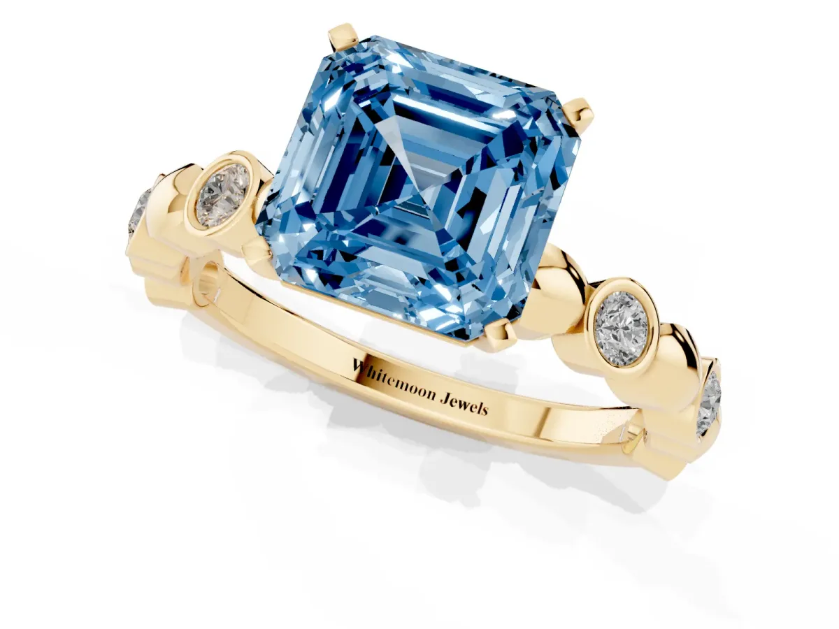 Fancy Blue Asscher Cut Solitaire Bezel-Set Diamond Ring with Beaded Band and Four-Prong Setting Yellow gold